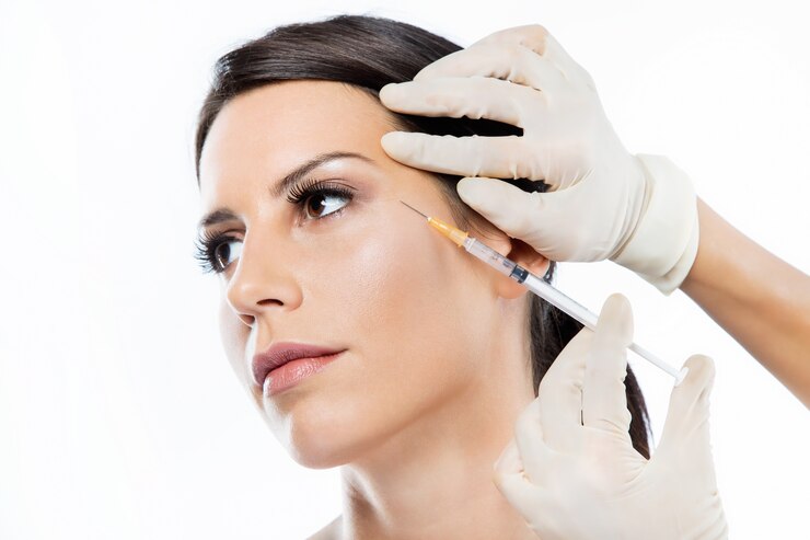 beautiful-young-woman-getting-botox-cosmetic-injection-her-face_1301-7520