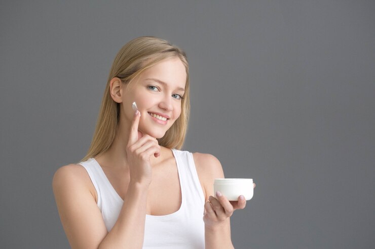 face-cream-woman-applying-crean-skin-natural-portrait-studio-shot_431835-996